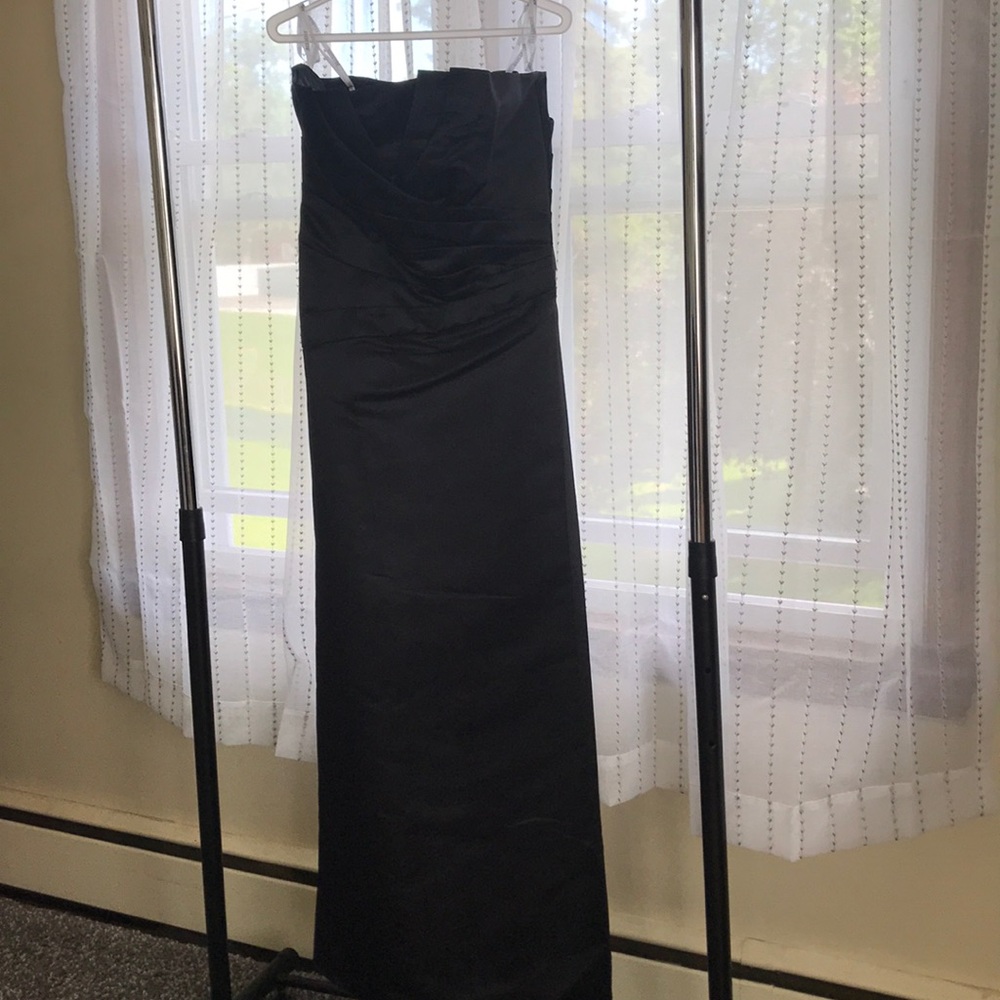 Bridesmaid gown. Black strapless satin gown.